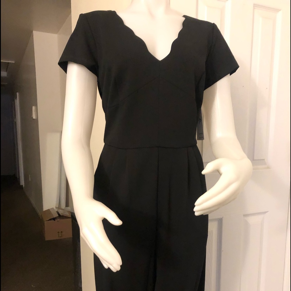 All black elegant jumpsuit .